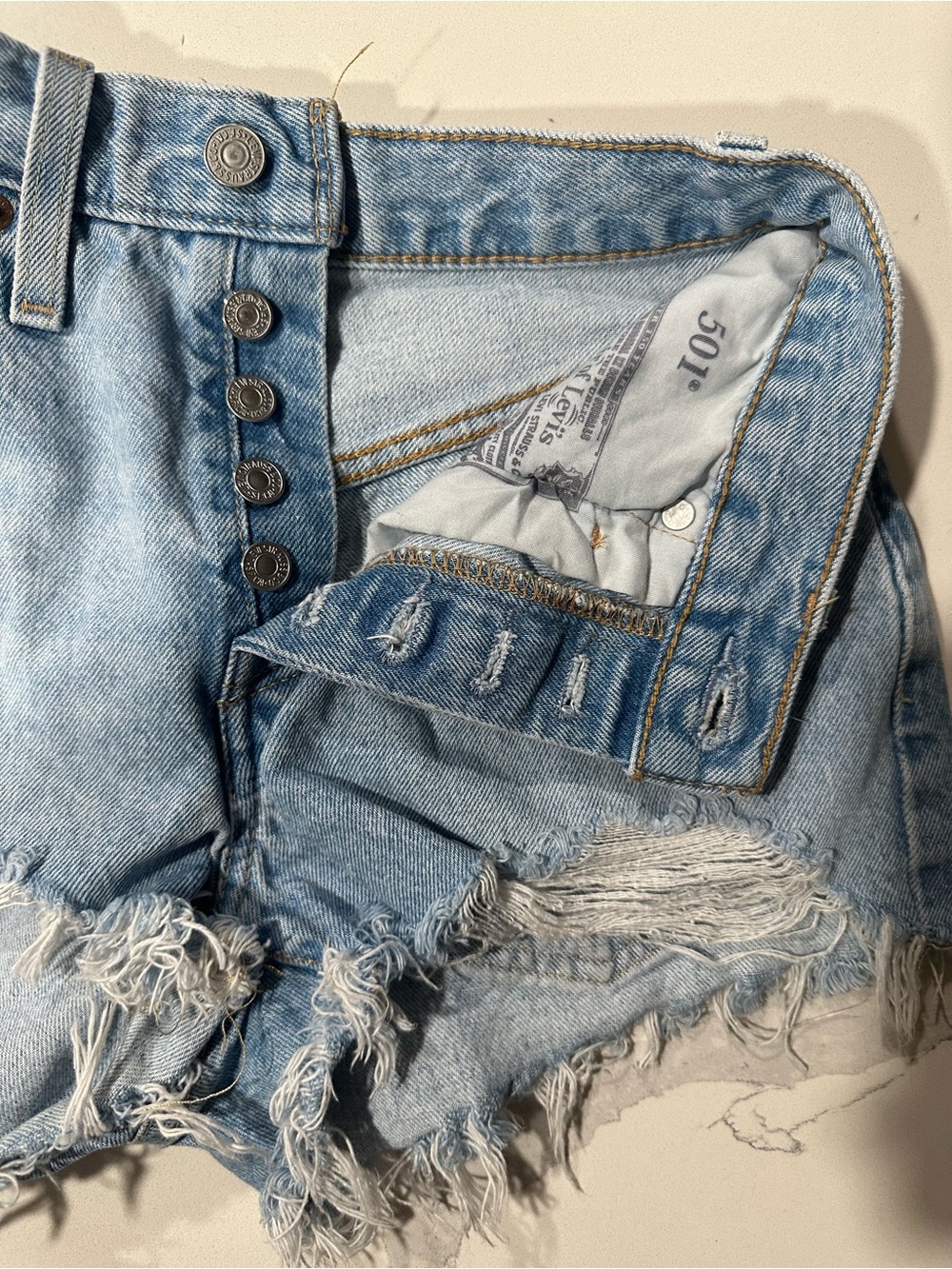 Levi's Light Blue Distressed High-Rise Denim Shorts - Picture 5 of 6